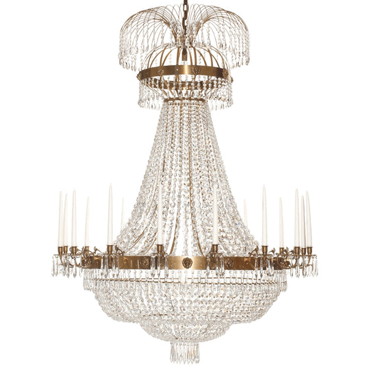 Light brass Empire chandelier with 16 arms and crystal octagons