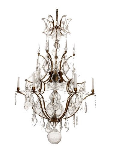 Large chandelier with crystals in Rococo style